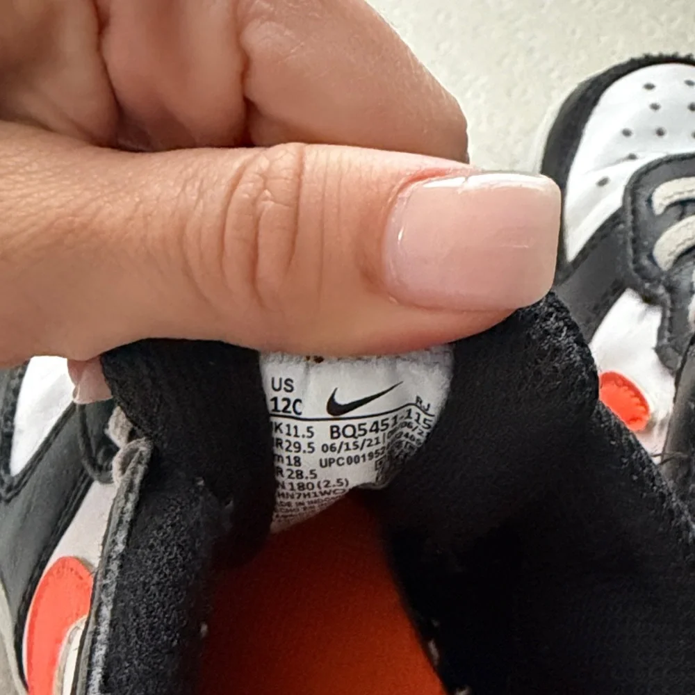 Nike Kids' Sneakers in Black, White, and Orange